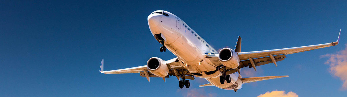 Aircraft Landing from Sunset Sky
