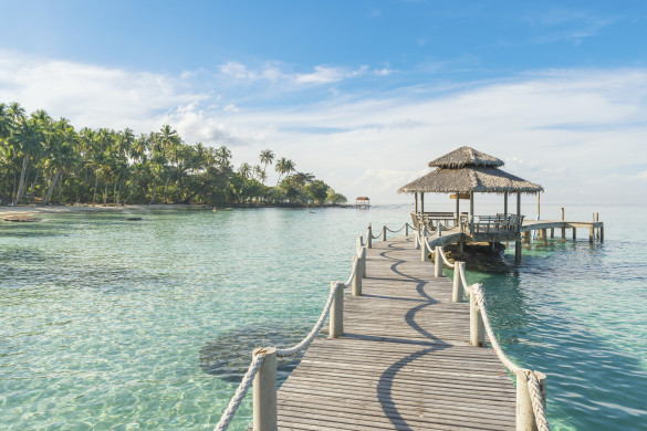 Summer, Travel, Vacation and Holiday concept - Wooden pier in Phuket, Thailand