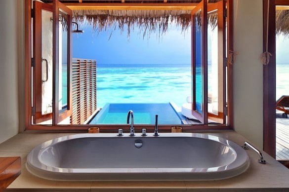 Badewanne in Wasser Bungalow mit Aussicht auf das Meer