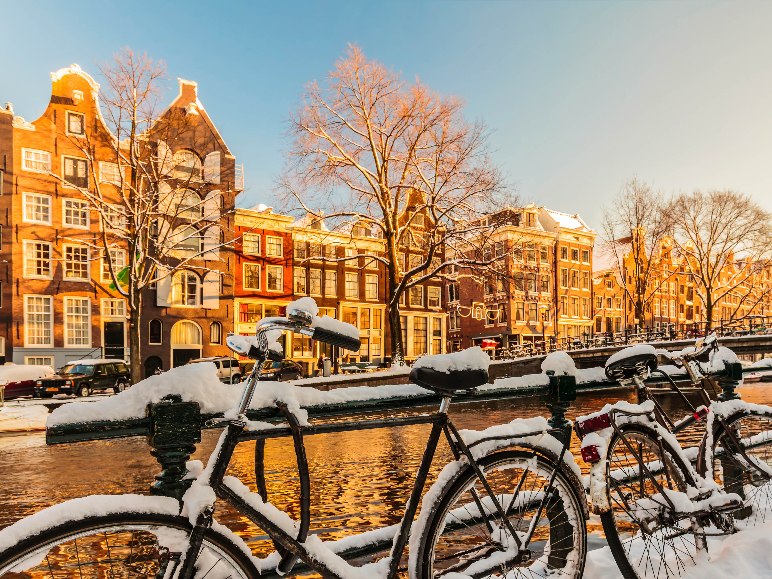 Bicycles covered with snow during winter in Amsterdam