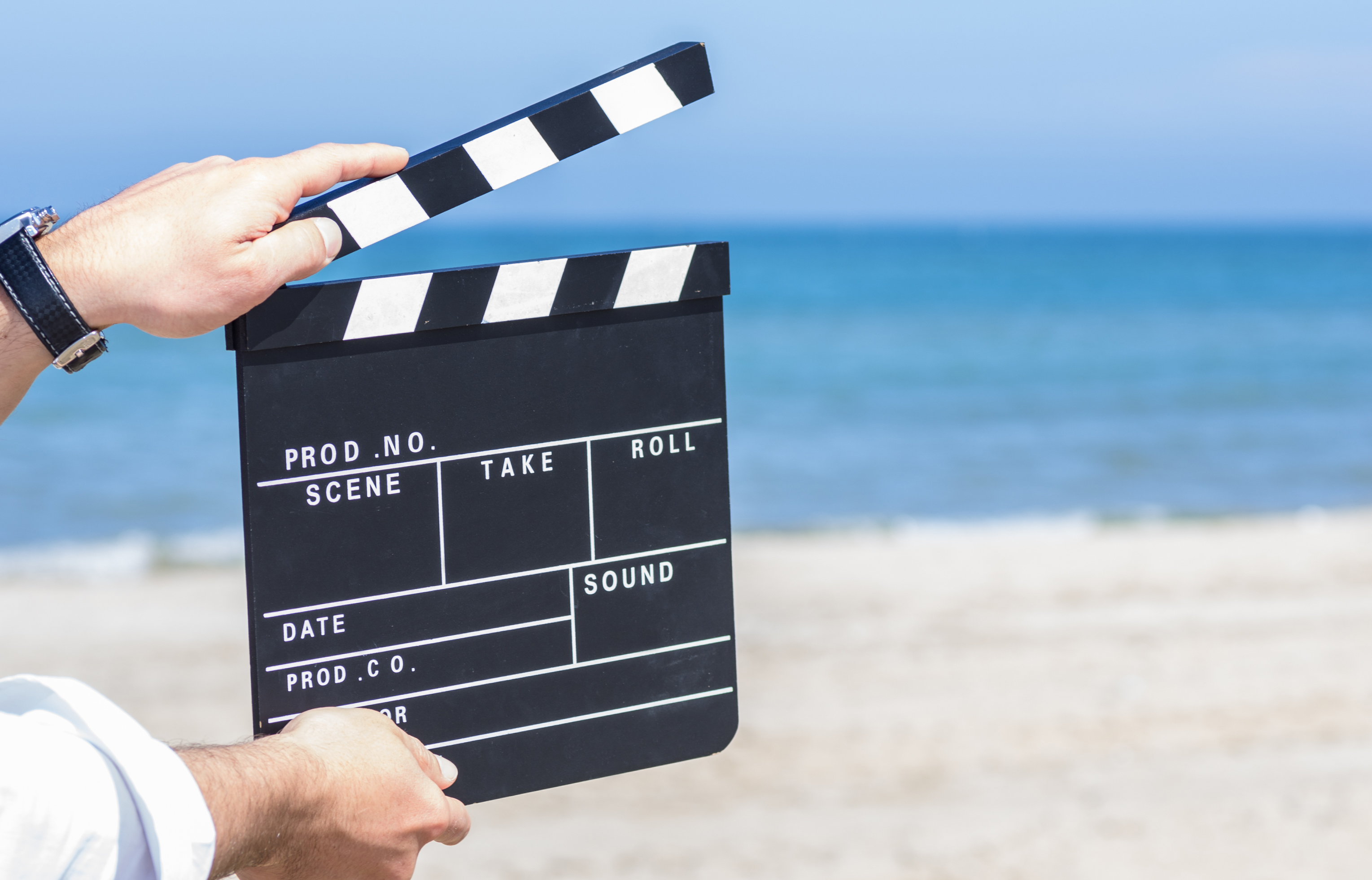 filmklappe am strand